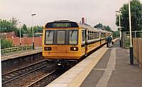 4  A couple of 142s in Merseyrail livery.  R S Greenwood 